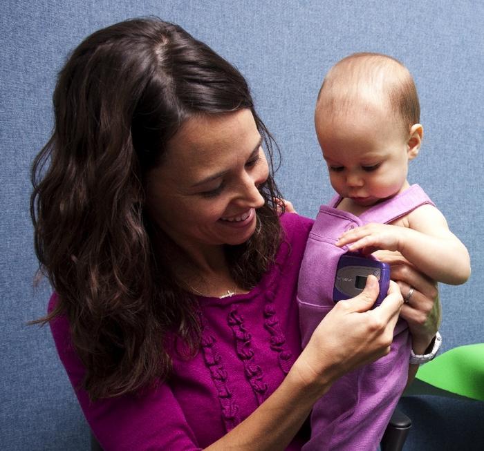 Wearable digital recording devices are used to capture day-long home audio recordings of each infant's natural language environment.