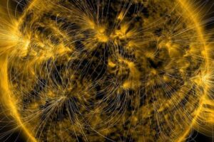 This image combines a depiction of the sun's magnetic fields with a photograph taken by NASA's Solar Dynamics Observatory. The intricate pattern of lines reveals how the sun's magnetism shifts and adapts in response to its constant internal and surface movements.