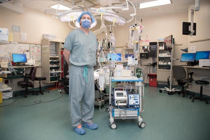 Dr. Anton Skaro, Associate Scientist at Lawson Health Research Institute and Surgical Director of Liver Transplantation at London Health Sciences Centre in London, Ont., is pictured with the pump that helps circulate blood to organs that are to be donated.