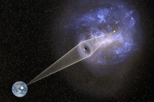 Artist's impression of a microlensing event caused by a black hole observed from Earth toward the Large Magellanic Cloud. The light of a background star located in the LMC is bent by a putative primordial black hole (lens) in the Galactic halo and magnified when observed from the Earth. Microlensing causes very characteristic variation of brightness of the background star, enabling the determination of the lens's mass and distance. Credit: J. Skowron / OGLE. Background image of the Large Magellanic Cloud: generated with bsrender written by Kevin Loch, using the ESA/Gaia database