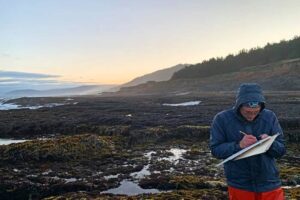 Zechariah Meunier of OSU conducts rocky shore surveys in California. Photo by Risa Askerooth.