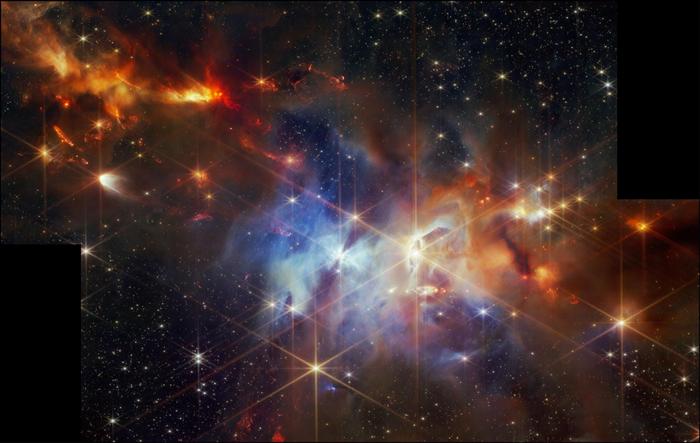 NASA's Webb telescope captures a stunning image of the Serpens Nebula, revealing a cluster of baby stars in the top left corner. These stars are still forming and shooting out powerful jets of gas in a surprising, aligned pattern. Unlike some nebulae, Serpens doesn't create its own light. Instead, it glows by reflecting light from nearby stars.