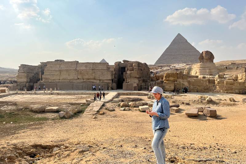 UNCW Professor Eman Ghoneim studies the surface topography of the section of the ancient Ahramat Branch located in front of the Pyramids of Giza and the Great Sphinx. Photo Credit: Eman Ghoneim/UNCW