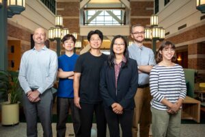 Illinois researchers have opened up the AI "black box" to gain valuable new insight about chemistry for solar energy applications. Pictured, from left: Professor Charles Schroeder, graduate students Changhyun Hwang and Seungjoo Yi, professor Ying Diao, professor Nick Jackson and graduate student Tiara Torres Flores. Photo by Michelle Hassel