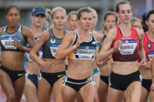 Aggie alumna Kim Conley (center) competed in the 5,000 and 10,000 meter events at the 2012 and 2016 Olympic Games. New research supports the idea that humans have long used endurance running as a way to chase down prey. (Photo by Brian Davies/The Register-Guard, Eugene, Oregon)