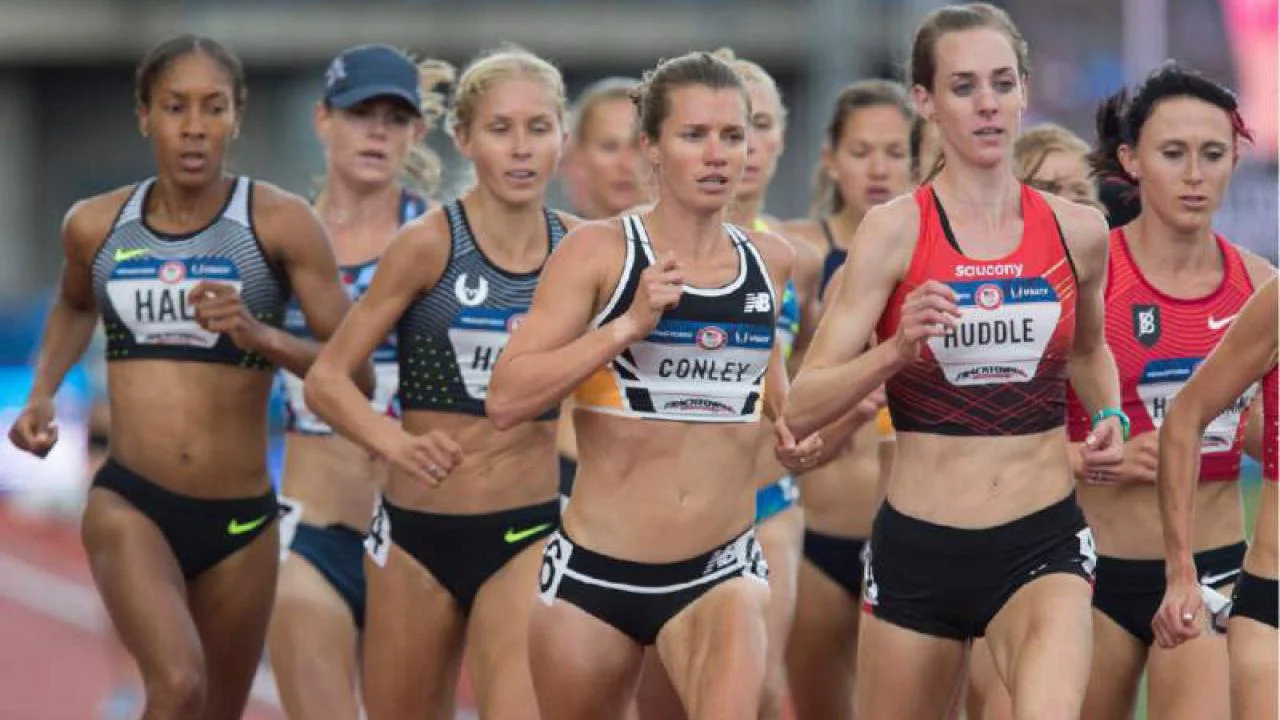 Aggie alumna Kim Conley (center) competed in the 5,000 and 10,000 meter events at the 2012 and 2016 Olympic Games. New research supports the idea that humans have long used endurance running as a way to chase down prey. (Photo by Brian Davies/The Register-Guard, Eugene, Oregon)