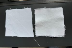 A chalk-based coating attaches to various commercially available textiles, including cotton and synthetic fiber, to create cooling fabrics, such as the treated synthetic material (right) that’s brighter than the untreated fabric (left).