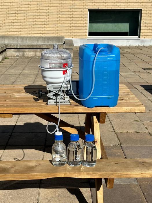 Mock-up of solar evaporation system (left), connected to temperature and humidity detection system (center), with a brine water injection system (right) and a purified water collection system.