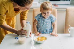 Child about to eat a sugary cereal