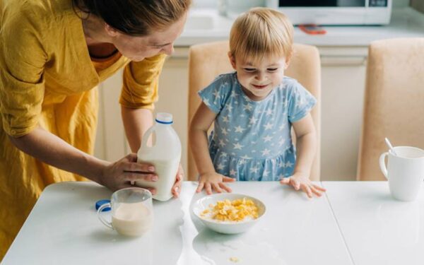 Child about to eat a sugary cereal