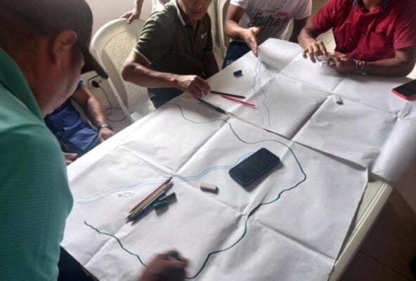 Workshop with community members to draw the map of their land.