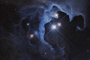 This Hubble Space Telescope image captures a triple-star system, which can host potentially-habitable planets. Our nearest stellar neighbour, the Alpha Centauri system, includes three stars.