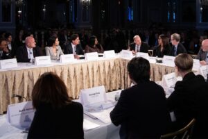 officials at a conference table