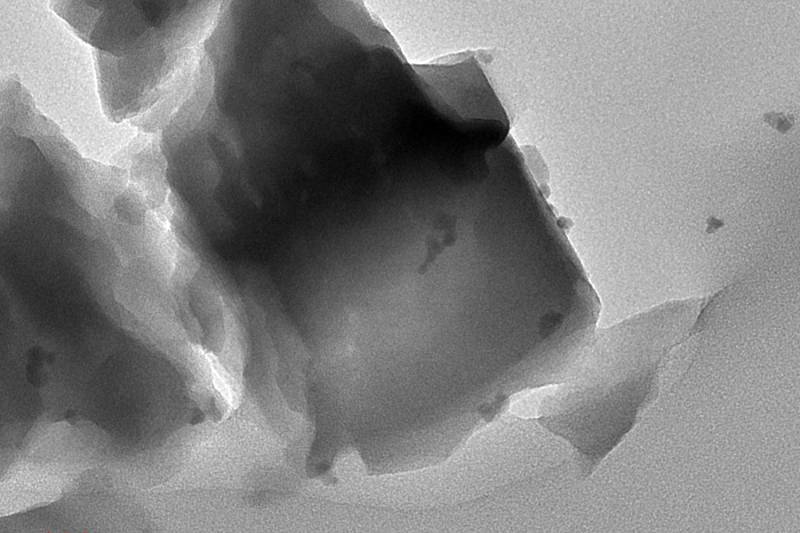 MIT chemical engineers designed a two-part catalyst that can convert methane gas to useful products. The catalyst consists of iron-modified aluminum silicate plus an enzyme called alcohol oxidase (enzyme not pictured).