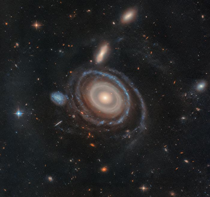 Cosmic Bull’s-Eye: Monster Galaxy’s Nine Rings Reveal Epic Space Collision