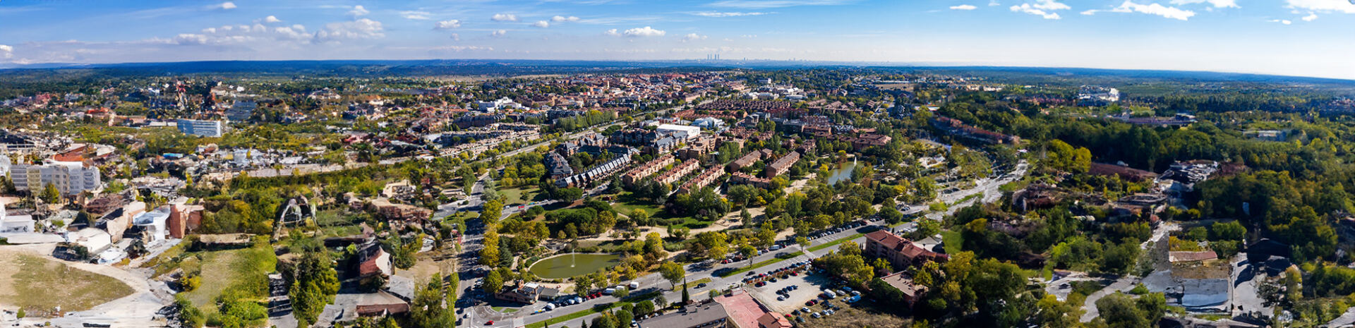 Magnificent aerial view of Las Rozas with the four towers of Madrid in the background.