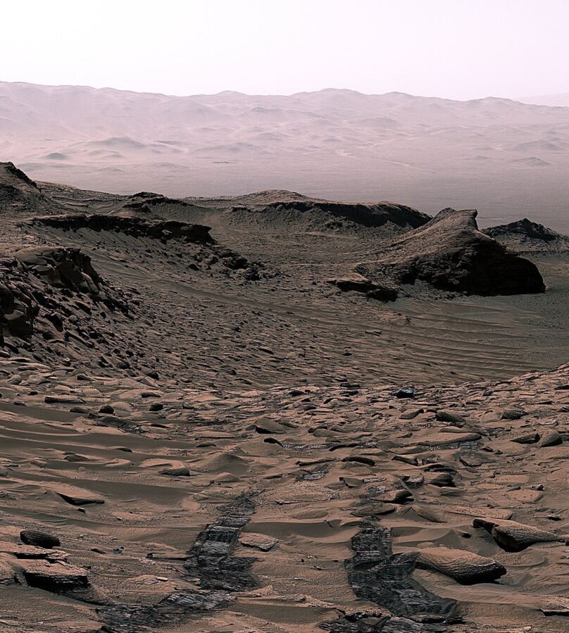 On April 30, 2023, NASA’s Curiosity Mars rover captured an image of its tracks fading into the distance at a location nicknamed “Ubajara.” This is the site wher