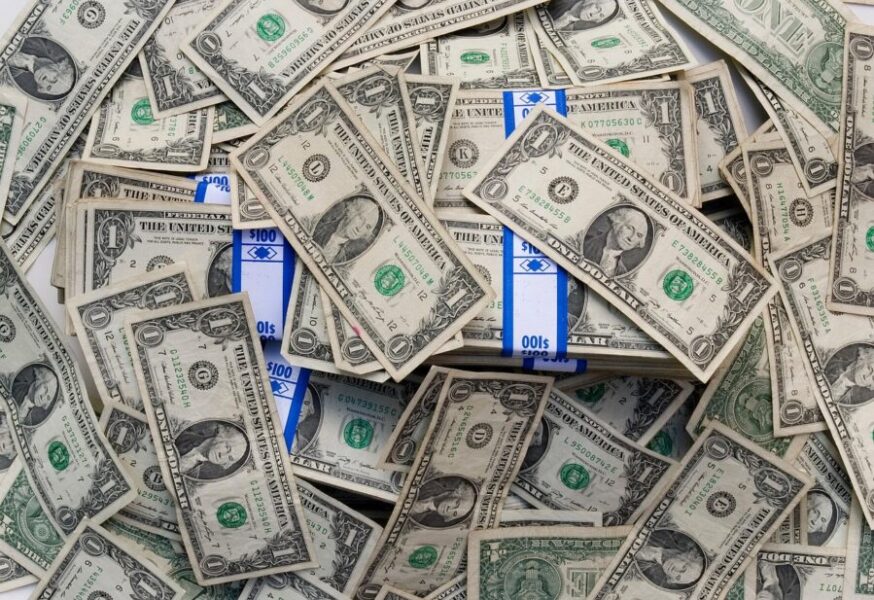 a mess of dollar bills