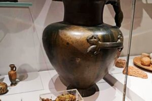 This bronze jar on display at the Ashmolean Museum contained a mysterious substance (shown in the foreground) that is very likely ancient honey.