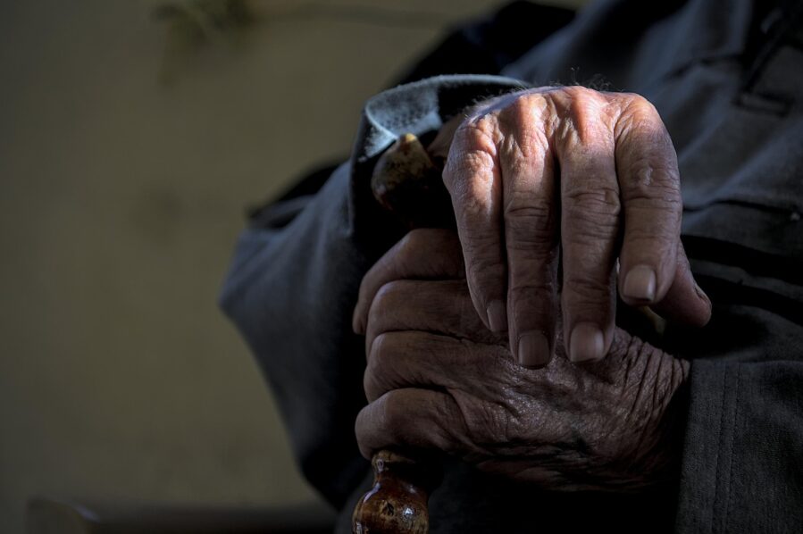 close up of the hands of an aging man