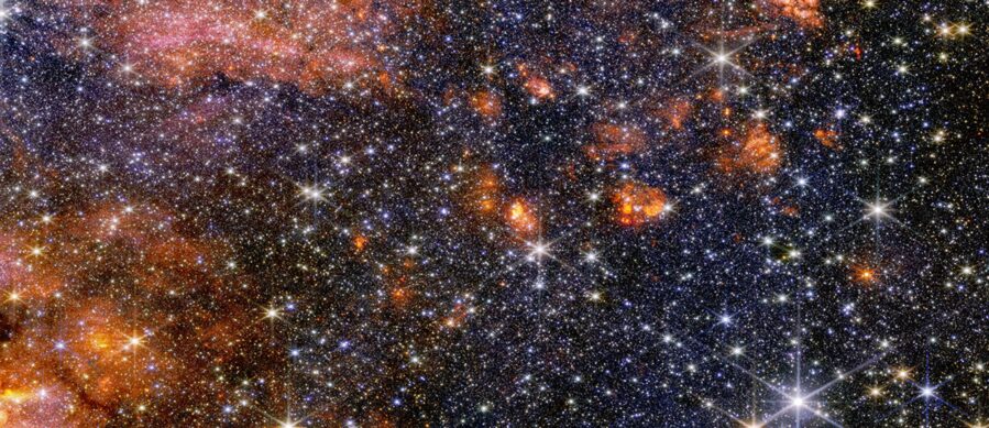 Stars, gas and cosmic dust in the Sagittarius B2 molecular cloud glow in near-infrared light, captured by Webb’s NIRCam instrument.