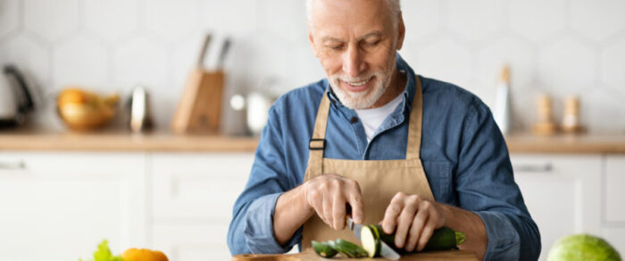 Man chopping vegetables