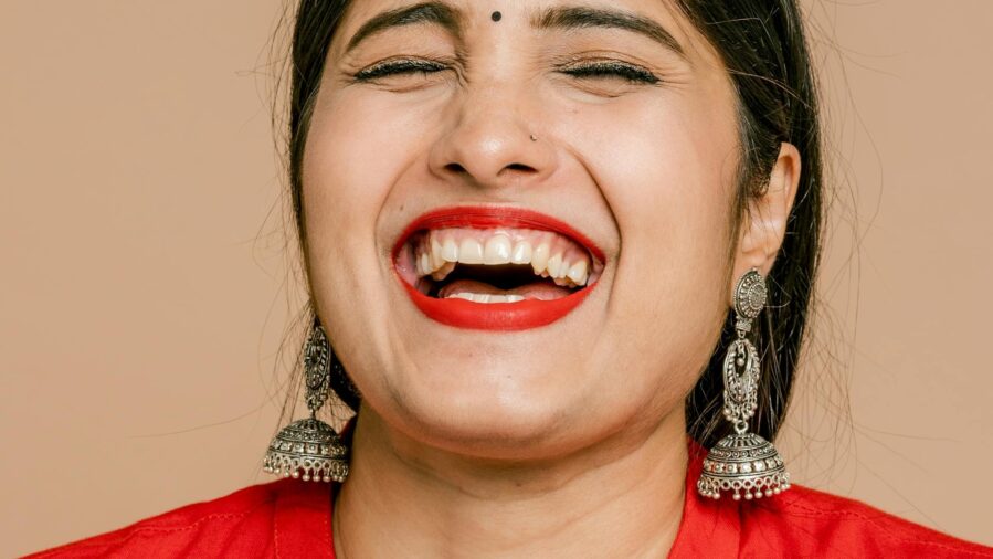 woman laughing with open mouth