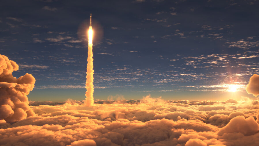 rocket flying past clouds