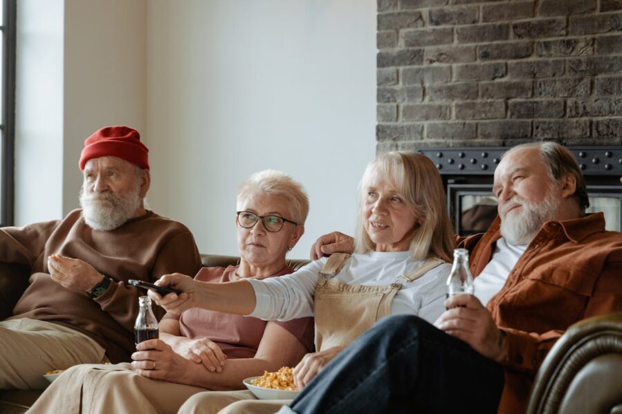 friends on couch with snacks