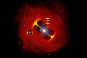 Artist’s impression of a forming galaxy cluster in the early Universe: radio jets from active galaxies are embedded in a hot intracluster atmosphere (red), illustrating a large thermal reservoir of gas in the nascent cluster.