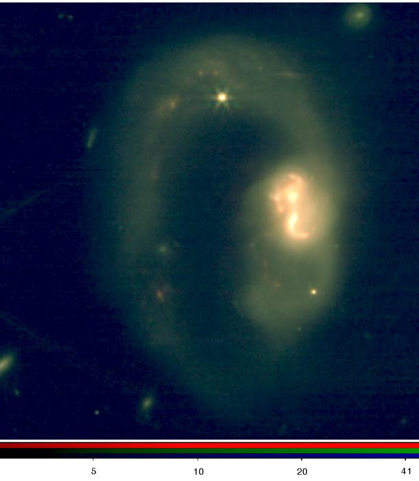 Hidden Galaxy Harbors Organic Chemistry Factory