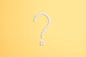 question mark of aspirin tablets