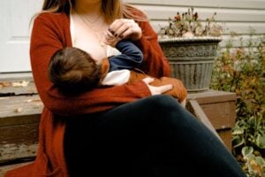 mother breast feeding infant