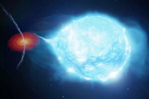 Jets of energetic particles streaming away from the black hole Cygnus X-1 (at left in this artist’s rendering) bend in the stellar wind from the supergiant star paired in orbit with the black hole. Researchers used the extent of the bending to produce the first measurement of the power of a black hole’s jets. IMAGE: ICRAR/CURTIN UNIVERSITY