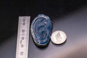 Human ear model printed in a gelatin-based resin using holographic VAM. 2026 LAPD EPFL CC BY SA