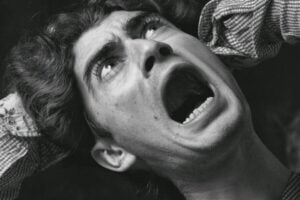 closeup of frightened man's face