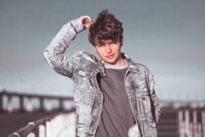teen boy in jeans jacket