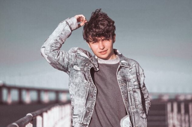 teen boy in jeans jacket