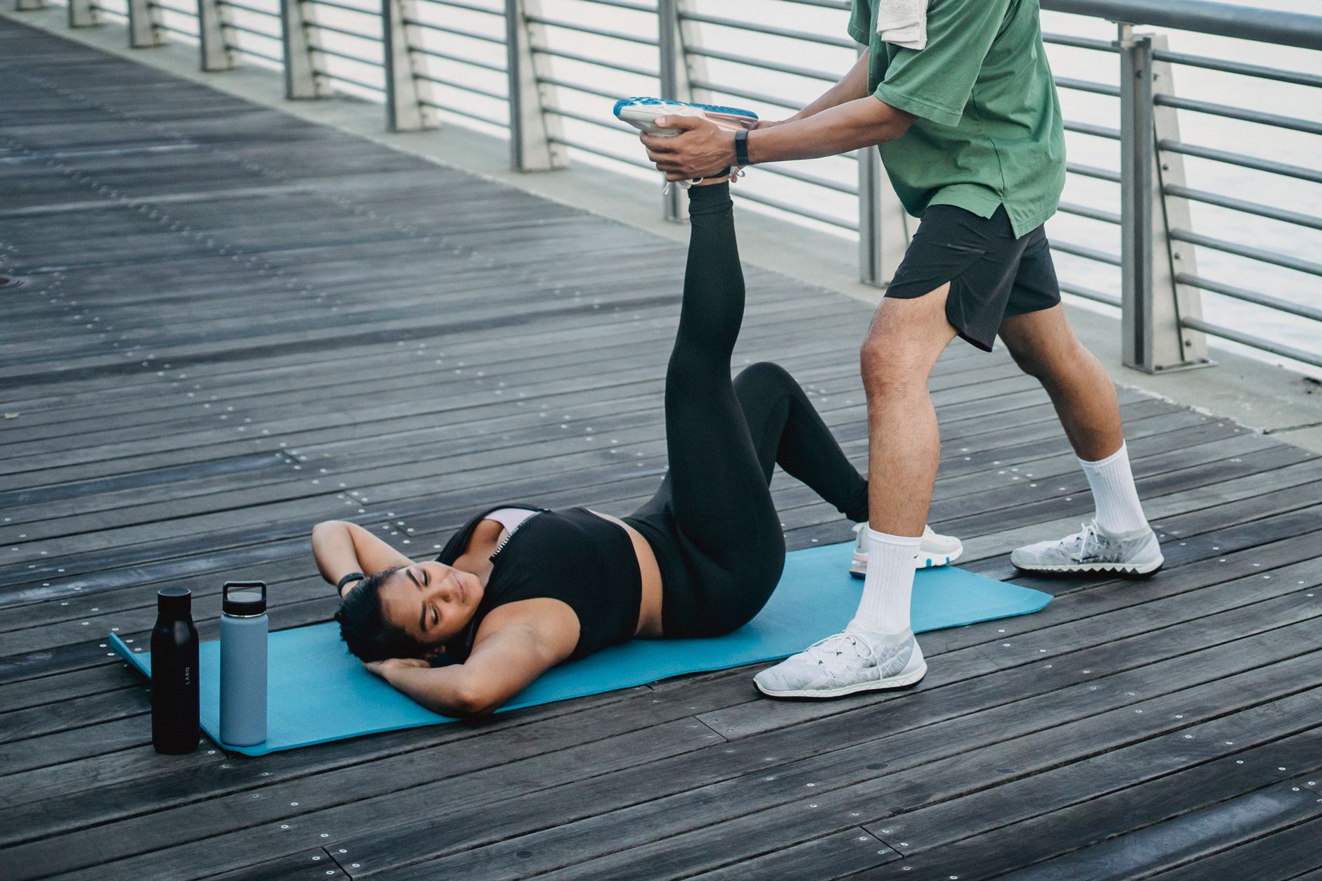 Representative image of a person stretching before exercise.