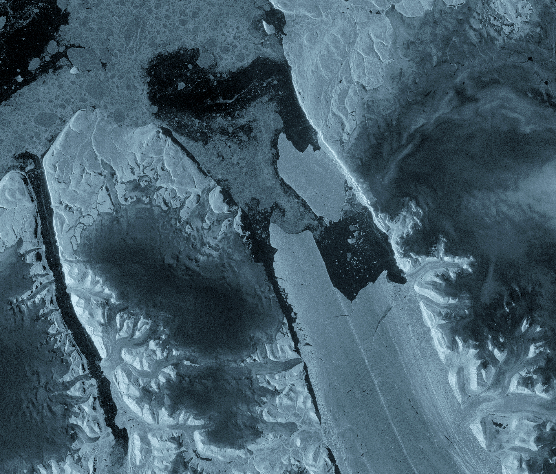 Sentinel-1 radar image of Petermann Glacier showing a large tabular ice island separated from the floating tongue in northwest Greenland