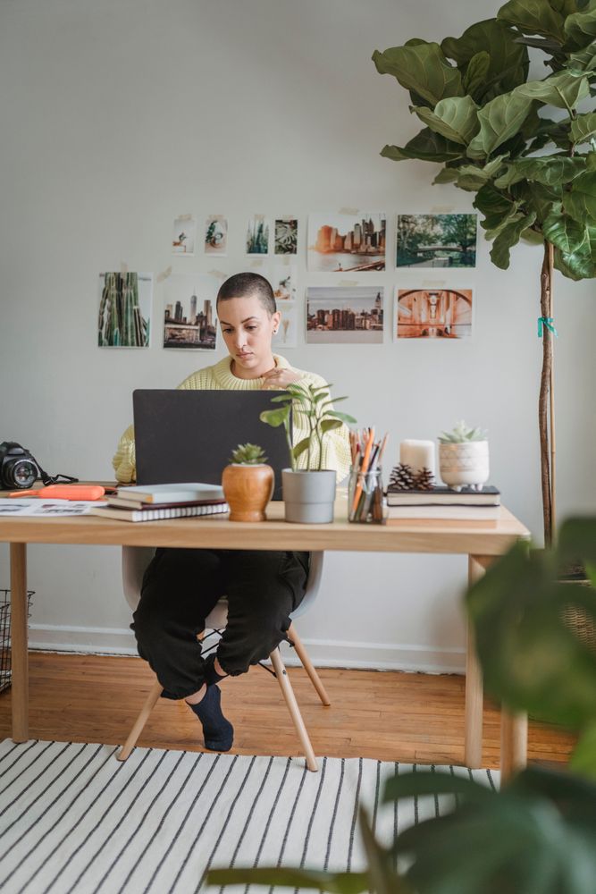 A representative image of a person working independently at a laptop, not a photograph of any person discussed in the article.
