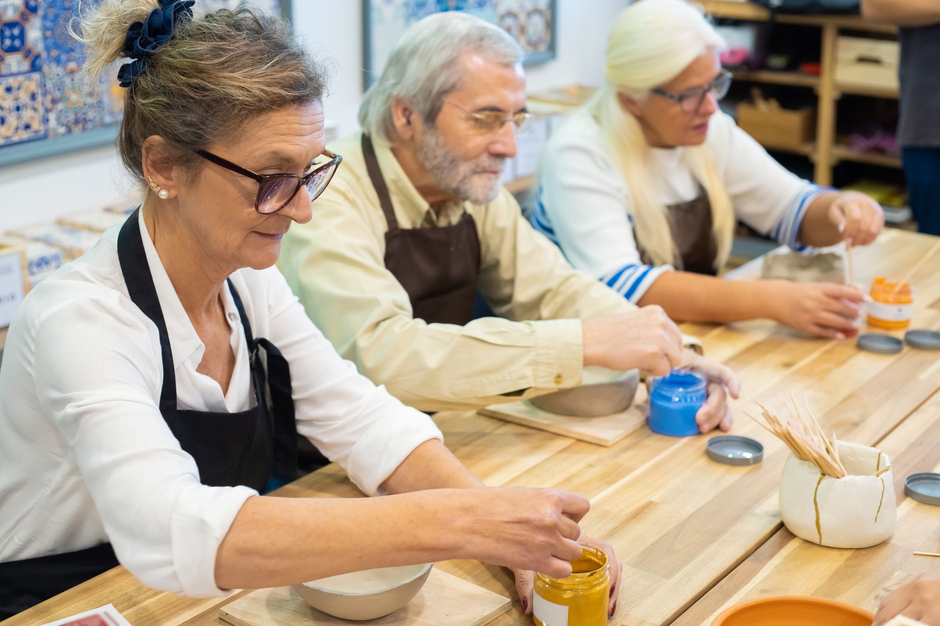 Representative older adult learning a creative activity