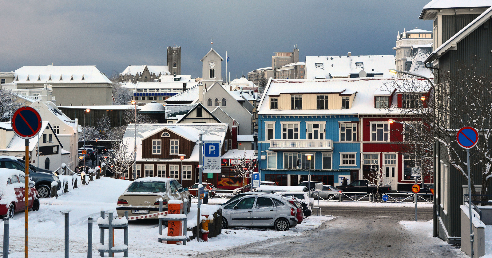 Snow-covered street and buildings in Reykjavík