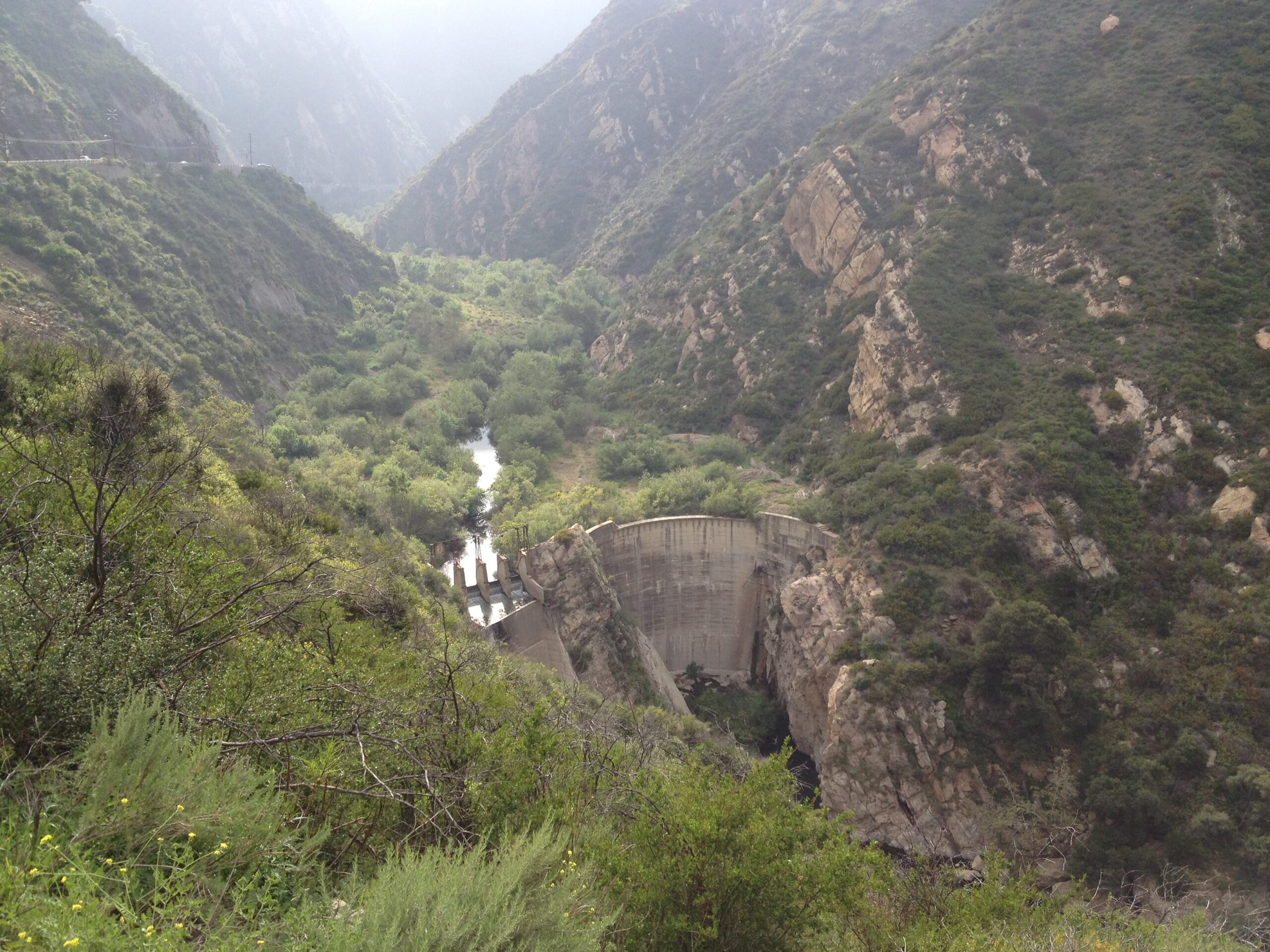 Malibu Canyon and Rindge Dam in the Santa Monica Mountains near Malibu, California — thematic canyon stock, not Streisand private property.