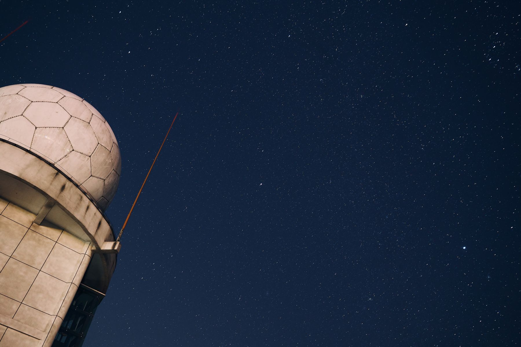The James Webb telescope does not orbit Earth: it circles the Sun–Earth L2 point 1.5 million kilometres away, keeping its mirror permanently shielded from the Sun—and unlike Hubble, it was never designed for astronauts to repair.